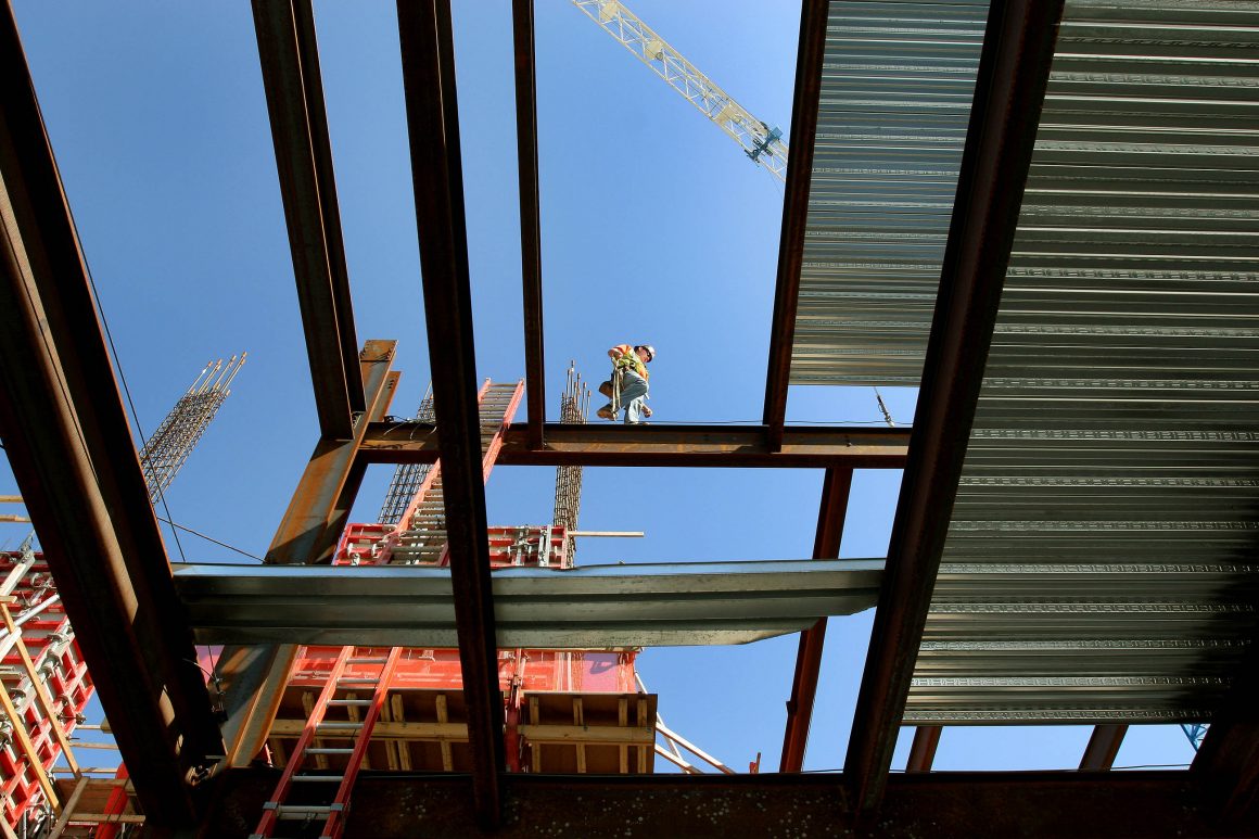 Iron worker on girders